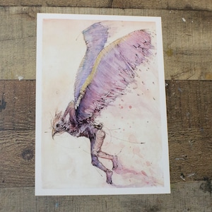May include: A watercolor painting of a winged creature with purple and yellow wings. The creature is depicted in mid-air, with its wings spread out and its body tilted forward. The background is a soft pink and white.