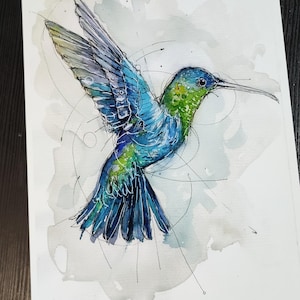 May include: Watercolor painting of a hummingbird in flight with a green head, blue body, and black and white wings. The background is a light gray with black lines and circles.