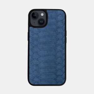 May include: A blue phone case with a textured, snakeskin-like pattern. The case has a black border and a camera cutout.