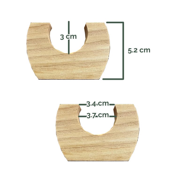 May include: Two light-colored wooden U-shaped holders with visible grain. The top piece shows a height of 3 cm and 5.2 cm. The bottom piece shows internal widths of 3.4 cm and 3.7 cm. These wooden components feature a flat base and a curved cutout.