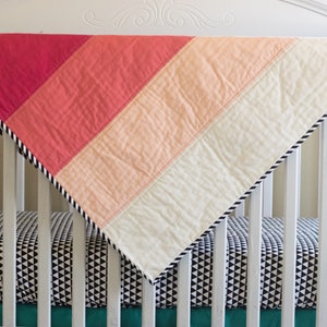 Pink striped quilt
