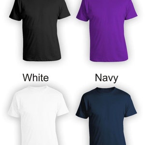 May include: Four t-shirts in different colors: black, purple, white, and navy blue. The t-shirts are all the same style, with a crew neck and short sleeves.