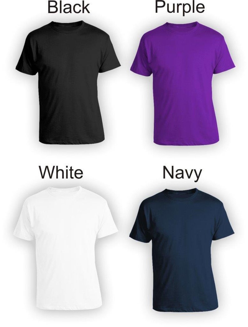 May include: Four t-shirts in different colors: black, purple, white, and navy blue. The t-shirts are all the same style, with a crew neck and short sleeves.