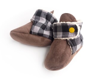 Buffalo plaid baby gift, soft + cozy infant footwear. Minimal new baby boots with faux fur. Easy snap baby booties, stay on newborn shoes.