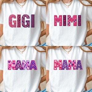May include: White t-shirts with the words "GIGI", "MIMI", "NANA", and "MAMA" in pink and purple embroidered letters. The letters are decorated with heart, polka dot, and patterned designs.