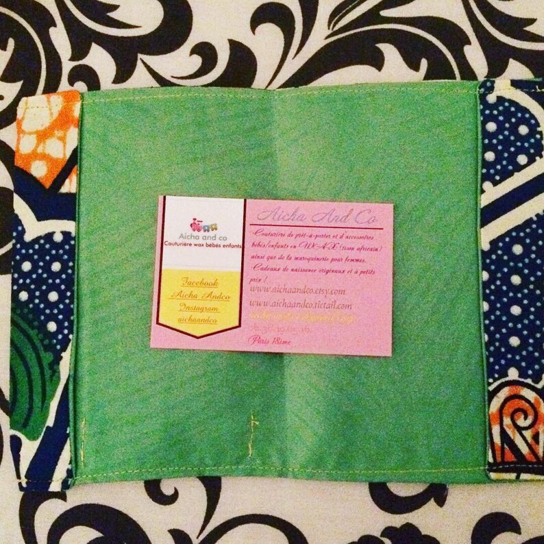 Prot\u00e9g\u00e9 Passport wax blue green yellow orange umbrella