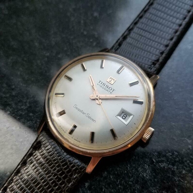 tissot seastar seven guld