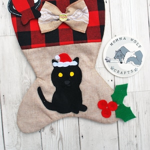 Personalised cat Christmas stocking with felt cat portrait.