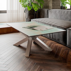 Side table or coffee table in spider shape looks amazing. Especially when you choose white, light looking legs and stone tabletop in interesting green color. Spider coffee table looks amazing also with burl wood tabletop.