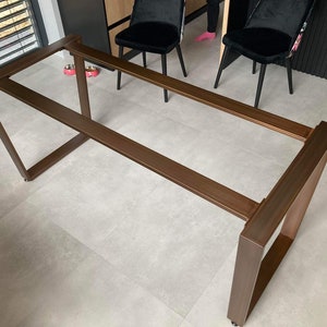 Awesome metal table legs for dining table. It's a very stable steel base, able to take a huge weight without any wobbling. It's perfect for marble and granite table tops.