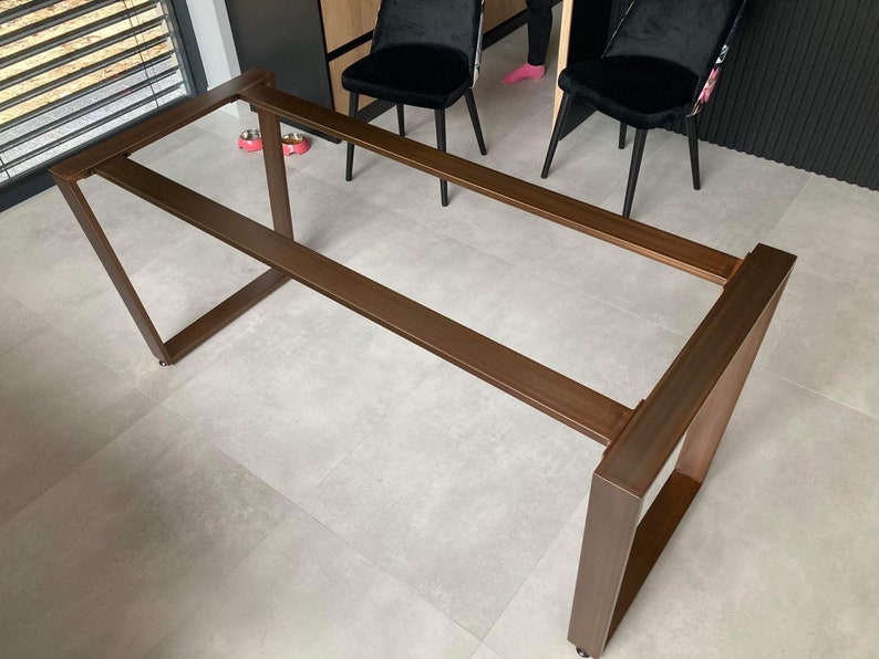 Awesome metal table legs for dining table. It's a very stable steel base, able to take a huge weight without any wobbling. It's perfect for marble and granite table tops.