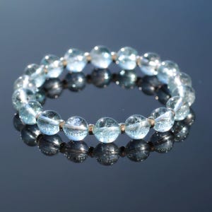 Sky Blue Topaz Posh Power Bracelet With Sterling Silver. Clear Topaz Crystal With Each Purchase. Stacking Blue Beads 22crystals