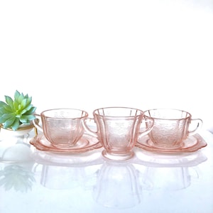 Pink glass teacup and saucer Madrid Recollections collection set