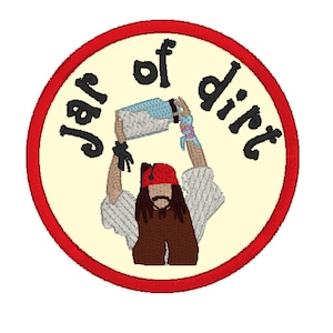 May include: A red, white, and blue embroidered patch with a cartoon pirate holding a jar of dirt. The text "Jar of Dirt" is written around the pirate.