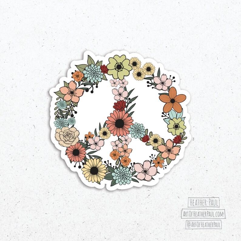 May include: A peace sign sticker with a floral design. The peace sign is outlined in white and filled with a variety of flowers in shades of pink, yellow, blue, and red.