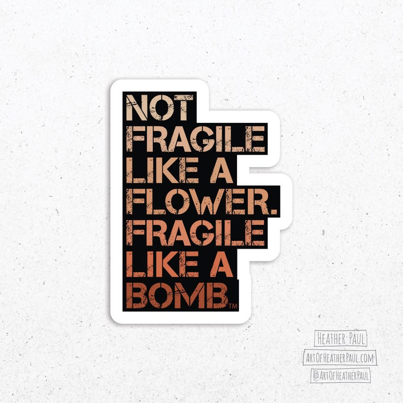 sticker reading "not fragile like a flower. fragile like a bomb" in a warm gradient over a white background with gray speckles