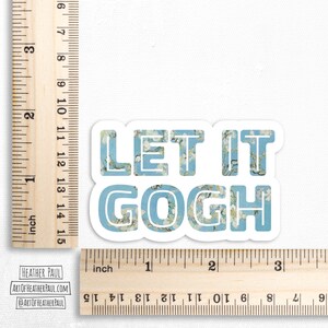 May include: A blue and white sticker with the text "Let it Gogh" in a stylized font. The letters are filled with a pattern reminiscent of a famous painting.