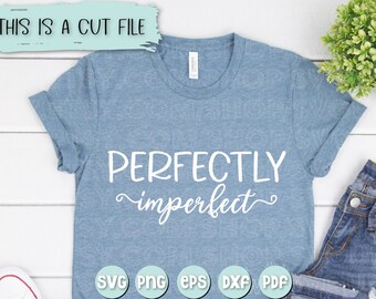 May include: A blue t-shirt with the text "PERFECTLY imperfect" in white. The shirt is laying flat on a white surface with a pair of blue jeans and white sneakers. The text "SVG PNG EPS DXF PDF" is in white circles on a light blue background.