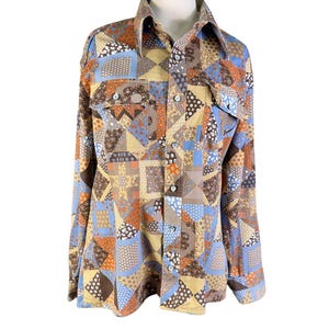 May include: A white ceramic mug with a black handle and the text "But First, Coffee" in a bold, black font. The mug is set against a neutral background, highlighting its simple design.