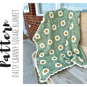Daisy granny square blanket with a green background, white petals, and a yellow center. The listing is for a digital download crochet pattern and not the finished blanket.