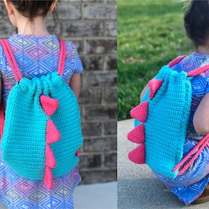 May include: A turquoise and pink crocheted dinosaur backpack with a drawstring closure. The backpack is being worn by a child.