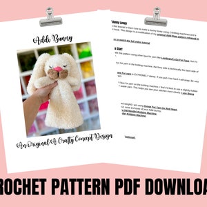 May include: A crochet pattern PDF download featuring a plush bunny toy. The image shows a cream-colored, fluffy bunny with a brown nose and ears. The text "Addi Bunny" is displayed above the bunny, and "An Original A Crafty Concept Design" is below it. The words "CROCHET PATTERN PDF DOWNLOAD" are at the bottom.