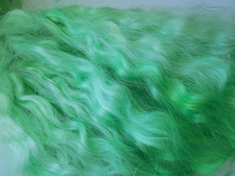 Premium mohair for doll hair.Color pale green Weight 30 grams. Length 23-25 cm