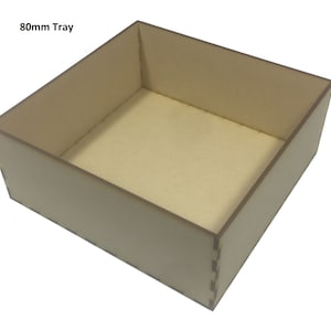 May include: A plain, light brown wooden tray with the text "80mm Tray" printed on the top.