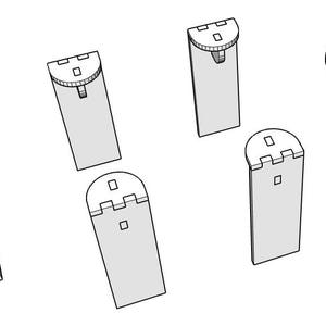 May include: Five white, rectangular, wooden blocks with a decorative top. Each block has a different design on the top.