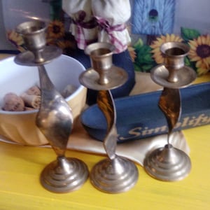 Brass swirl candleholders