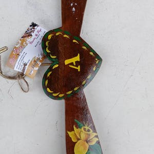 Vintage hand painted wooden hangar