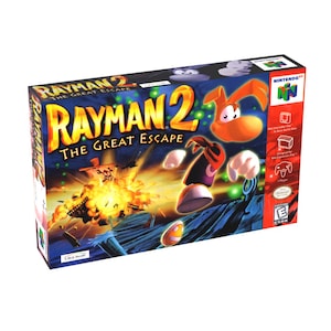 May include: A boxed copy of the video game "Rayman 2: The Great Escape" for the Nintendo 64. The box features Rayman in a dynamic pose against a fiery explosion background. The game's title is prominently displayed in yellow and orange.