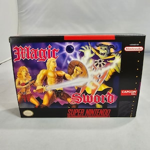 May include: A Super Nintendo Entertainment System game box for Magic Sword. The box features a purple background with a warrior holding a sword, a woman with a crossbow, and a monster with a shield. The game is licensed by Nintendo and published by Capcom.