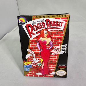 May include: A video game box for the Nintendo Entertainment System featuring a cartoon image of Jessica Rabbit from the movie "Who Framed Roger Rabbit?" The box is red, black, and gold with the title "Who Framed Roger Rabbit?" and the text "Can you solve the mystery?" The box also features the Nintendo Entertainment System logo and the Power Play Series logo.