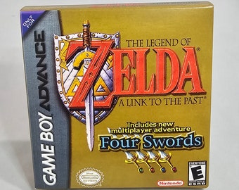 May include: A gold Game Boy Advance game cartridge case for The Legend of Zelda: A Link to the Past. The case features a red sword and shield design with the game title and a new multiplayer adventure, Four Swords.