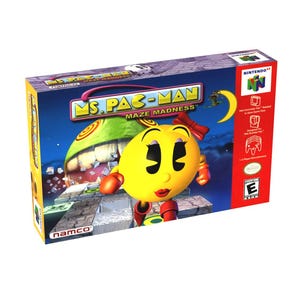 May include: A video game box for Ms. Pac-Man: Maze Madness. The box features a yellow Ms. Pac-Man character with a red bow, red lips, and red gloves. The background is a blue night sky with a green monster and a crescent moon.