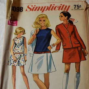 May include: Vintage Simplicity sewing pattern number 1098 for a mini-length dress and jacket. The pattern is from the 1960s and features three different views of the dress and jacket. The dress is a simple A-line style with a belt, and the jacket is a double-breasted style with a collar.