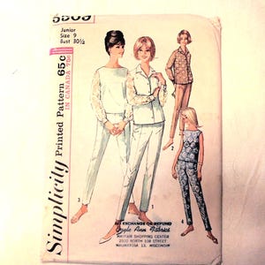 May include: A Simplicity sewing pattern envelope for a junior size 9, bust 30 1/2, featuring illustrations of four different outfits including long-sleeved tops, collared shirts, and trousers with various floral and solid patterns printed on the front.