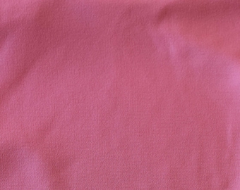 Tela de punto vintage, color rosa flamenco, ligera, se vende cortada a medida.