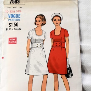 May include: Vintage Vogue Pattern 7593 featuring illustrations of two dresses. One dress is white, the other is red. The pattern includes sizing information and the Vogue Pattern logo. The text "NEW Sizing" is also visible.