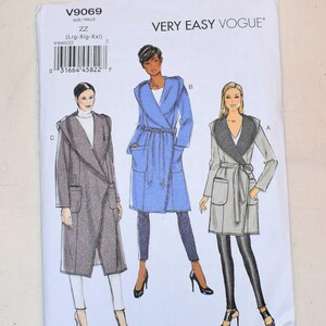 May include: A Very Easy Vogue sewing pattern, V9069, featuring illustrations of three different coat designs. The pattern includes sizes ZZ (Lrg-Xlg-XXl). The cover is white with the Vogue logo and product information.