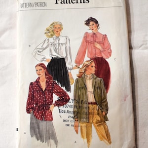 May include: A Vogue Patterns sewing pattern envelope, number 1178, size 12. The front features illustrations of four different blouse and jacket styles in white, pink, red with white dots, and olive green, paired with various skirts and trousers.