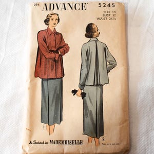 May include: An Advance 5245 sewing pattern envelope for a size 14, bust 32, waist 26.5 inch two-piece outfit. The illustration shows a red jacket with a skirt and a grey jacket with a skirt, featuring the text As Featured in MADEMOISELLE.