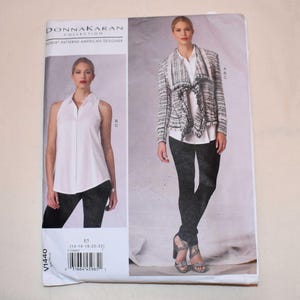 May include: A sewing pattern from the Donna Karan Collection. The cover features a woman wearing a white sleeveless top and black pants, and another wearing a black and white jacket, white shirt, and black pants. The pattern number is V1440.