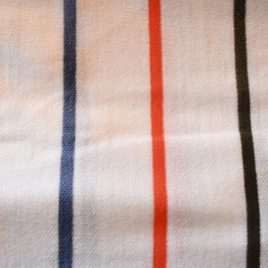 Unused Vintage 1970s White Jersey Knit Fabric with Narrow Stripes Yellow Black Red Blue T Shirt Fabric Sold as One Piece