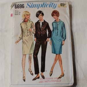May include: Simplicity sewing pattern number 6696 for a dress. The pattern is for a miss, size 18, bust 38. The pattern shows three different styles of dresses: a beige dress with a collar, a brown dress with a collar and a blue dress with a collar. The pattern is 65 cents.