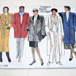 May include: A vintage Vogue's Basic Design sewing pattern featuring illustrations of women's coats and jackets. The pattern cover displays five different coat designs in various colors, including yellow, red, gray, white, and blue. The pattern number is 1446.