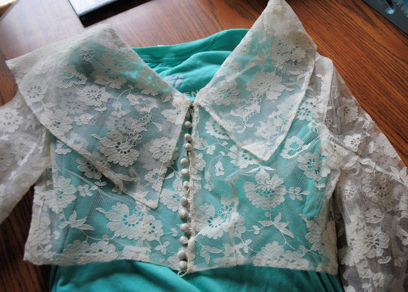Back V Neckline with Button and Loop Closure Front Cowl Neckline Vintage 1950s Fitted Lace Bolero Jacket