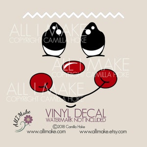 May include: A whimsical vinyl decal featuring a cartoon face with black eyes, a red nose, and red cheeks. The design includes a smiling mouth and a decorative zigzag element at the top. The text "VINYL DECAL" is also included.