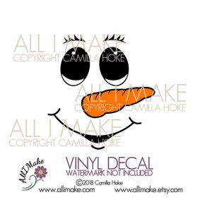 May include: A black and white snowman face with black eyes, eyelashes, and a smile. The snowman has an orange carrot nose. The image includes the text "ALL I MAKE" and "COPYRIGHT CAMILLA HOKE".